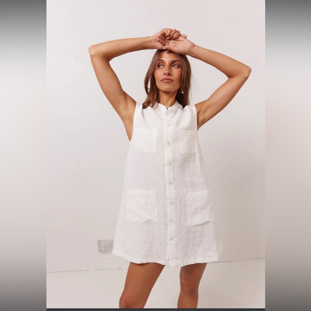 Sleeveless White Button-Up Top